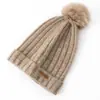 Gorro 100% cachemir puro, gorro de invierno tejido para adultos, con pompón de piel sintética, diseño que cubre las orejas y tejido de canalé cálido. Disponible en estilos para hombre y mujer