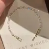 Pulsera de circonita multicolor de lujo ligero para comercio exterior europeo y americano, deslumbrante con incrustaciones de diamantes, a la moda, simple, elegante, joyería de alta gama al por mayor