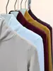 Camiseta Base de Cuello Alto Estilo Europeo para Mujer, Otoño e Invierno 2025, Elegante y Cálida de Manga Larga, Camiseta Lisa de Hombro Normal