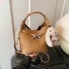 Bolsa de Mão Estilo Balde Nova Moda 2026 Outono e Inverno Versátil Retrô Bolsa de Mão Grande Capacidade Bolsa para Ir ao Trabalho Mãe e Filha