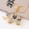 Llavero de Elefante con Forma de Corazón Creativo Transfronterizo Colgante de Metal con Pedrería para Bolso de Mujer Regalo de Vacaciones Yiwu Venta al por Mayor de Pequeños Productos