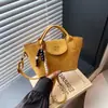 Bolso de Mano, Bolso Tote Pequeño, Bolso Retro de Color Café de Alta Gama para Viajar, Nuevo Bolso Cruzado de Hombro Único con Diseño de Nicho para Mujer