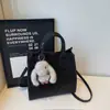 Bolsa de Grande Capacidade Bolsa de Mão Moda Nova Outono e Inverno 2025 Bolsa de Ombro Transversal Versátil Bolsa Tote Simples Retrô