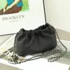 Venta al por mayor de fábrica nuevo bolso de piel de vaca de primera capa para mujer bolso nube hombro portátil bandolera bolso de madre bolso cuadrado pequeño