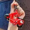 Pingente criativo de chaveiro de patinete elétrico de fricção, brinquedo divertido para aliviar o estresse de estudantes, presente para máquina de pegar bichos atacado