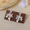 Accesorio Versátil de Primavera: Pendientes Flor de Diamante Azul Hielo, Dulces, Delicados, Sencillos, Lujo Ligero, Modernos, De Alta Gama