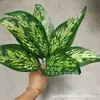 Pequeñas plantas verdes estilo bosque con 7 ramas, láminas de plástico impresas en 3D, hojas simuladas, fabricante mayorista para proyectos de embellecimiento de paredes vegetales