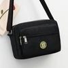 Bolsa de pano de flores Nova bolsa crossbody feminina Pano Oxford Bolsa de mãe de meia-idade e idosa Bolsa Bolsa de ombro multicamadas Bolsa de lona