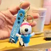 Novo chaveiro de desenho animado do Snoopy pingente de bolsa de casal chaveiro de carro boneca de borracha macia pequeno presente atacado