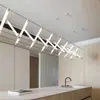 Lámpara de banco larga de diseño posmoderno para cafeterías y bistrós, creando una atmósfera única y creativa para las mesas de comedor de restaurantes