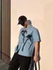 Camisa de Manga Corta Azul de Moda para Hombre Estilo Coreano Cool y Guapo Cuello Cubano Estampado Original Estilo Vacacional de Moda para Hombre Verano 2025