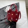 Textura de alta qualidade Bolsa de grande capacidade feminina outono 2024 Nova moda viajante bolsa de ombro Tote Bucket Bag