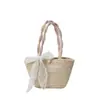 Bolsa de palha tecida à mão 2026 novo estilo, moderna e da moda, perfeita para férias, uma bolsa tote de rattan feminina para a praia
