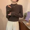 Otoño e Invierno 2023 nuevo Maillard Marrón camisa básica mujer cuello alto medio estilo occidental suéter de punto corte ajustado top interior