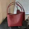 Bolso de hombro tejido de patrón simple transfronterizo para mujer 2026 nuevo modelo bolso de axila bolso cubo bolso de mano conjunto de bolsos