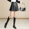 Saia de couro PU de cintura alta, estilosa e que rejuvenesce, saia curta plissada para mulheres, nova coleção outono/inverno 2026, saia midi elegante e versátil, moderna