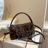 Design de nicho plissado bolsa única de alta qualidade feminina verão 2026 nova bolsa versátil tipo nuvem bolsa de ombro única para usar sob o braço