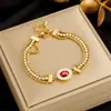 Pulseira europeia e americana de nicho transfronteiriço retro de ouro multicamadas strass corrente borboleta vida árvore olho acessórios pulseira