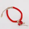 Este año pulsera de cordón rojo cobre rojo calabaza festiva bolsa de dinero oro rosa femenina acero de titanio retención de color regalo de Tanabata