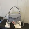Bolsa de Mão Tendência Elegante Cor Sólida Simples 2026 Inverno Nova Casual Temperamento Ombro Único Transversal Pequena Quadrada Bolsa Feminina