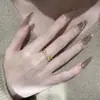 Tienda de oro con anillo de cruz de diamante de lujo ligero popular en línea dulce fresco nuevo lujo ligero alto sentido diseño abierto sensación