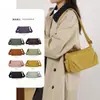 Comércio Exterior Transfronteiriço 2025 Novo Modelo Bolsa Feminina Simples Plissada Multicompartimentos Tecido de Nylon Impermeável Leve Bolsa de Ombro Bolsa Transversal