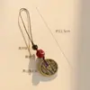 Llavero Espíritu de Montaña Colgante para Teléfono Móvil Estilo Étnico Tejido a Mano Cinnabar León Despertar Bendición Colgante de Joyería Venta al por Mayor