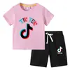 2026 Verão Nova Camiseta Infantil Comércio Exterior Roupas Infantis Ins Estilo Coreano Algodão Infantil Manga Curta e Shorts Conjunto de Duas Peças