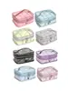 Bolsa de almacenamiento tres en uno transparente con láser hecha a medida transfronteriza para madre e hijo, bolsa de tocador y maquillaje de gran capacidad dividida para Amazon