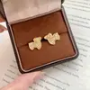 Pendientes retro de filigrana en piel de cordero dorada, nuevo diseño de zodiaco chino de oveja, ligeros y lujosos, de nicho y alta gama, pendientes nuevos y populares para mujer