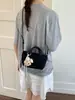 Dropshipping Transfronterizo Bolsos de Mujer 2026 Nuevo Bolso de Cesta de Verduras de Mano Bolso para el Trabajo y el Trayecto Pequeño Bolso Cruzado tipo Cubo