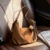 Bolsa de Gran Capacidad para Mujer 2025 Invierno Nuevo Estilo Maillard Retro Bolsa de Viaje Bolso Cruzado de Nicho Mochila