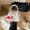 Bolso Único de Lunares 2026 Primavera Nuevo Elegante Bolso Concha Moderno Cruzado Bolso para Labiales para Salir