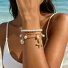 Pulseira com Pingente de Estrela do Mar e Concha Estilo Praia Europeu e Americano Transfronteiriça, Joia Multicamadas de Pérola Sintética Personalizada e Fashion para Mulheres
