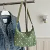 Bolso de mano plisado de estilo moderno y dulce para mujer, nueva colección de verano 2026, tela de pana con lunares, bolso de hombro versátil y bolso de axila