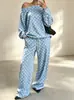 Conjunto de sudadera de lunares sin hombros y pantalones de pierna ancha estilo europeo y americano 2026, un conjunto de dos piezas moderno y casual para mujer