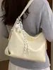Bolso pequeño súper popular para mujer, nuevo bolso de hombro de moda y elegante primavera-verano 2026, bolso cruzado tipo cubo versátil