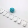 Venta al por mayor de accesorios de encaje de escoba con borlas de algodón blanco puro de fábrica, accesorios de ropa, accesorios decorativos, cinturón de encaje