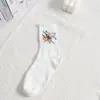 Fábrica Xinma Atacado Moda Graffiti Jovem Casual Meias Esportivas Brancas Simples Rebelde Tendência College Meias