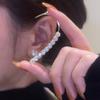 Pendientes de lujo ligeros de alta gama con clip de oreja de circonita sin orificio para la oreja, diseño de nicho femenino, pendientes sencillos que combinan con todo, al por mayor