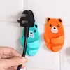 Gancho Adhesivo Multifuncional de Oso de Dibujos Animados sin Taladro Organizador de Cables Adhesivo Fuerte Soporte de Almacenamiento para Enchufe Eléctrico Venta al por Mayor