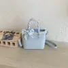 Bolsa Quadrada Pequena Xadrez com Laço Rosa Feminina 2026 Nova Chegada Primavera Estilo Coreano de Nicho Moda Versátil Bolsa de Ombro Único Transversal