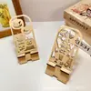 Ornatos de Mesa de Abóbora de Halloween Criativos Transfronteiriços Suporte de Exibição de Celular Oco de Madeira Suportes Preguiçosos Ornatos