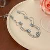 Exquisito collar de mariposa de doble capa con diamantes brillantes, elegante cadena de clavícula de nicho de moda para mujer, cadena de cuello de celebridad de Internet de lujo ligero de alta gama
