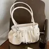 Bolso de cubo plisado elegante de mano para mujer 2026 verano nuevo bolso casual simple de un solo hombro versión coreana sensación de alta gama bolso de mujer