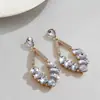 Pendientes transfronterizos europeos y americanos de aguja de plata con forma de gota de agua ovalada y diamantes, pendientes de estilo francés de lujo ligero, pendientes de lujo de alta gama para mujer