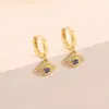 Pendientes creativos de cobre con forma de ojo de diablo con incrustaciones de circonita personalizadas, de latón chapado en oro auténtico, de venta caliente, transfronterizos europeos y americanos