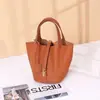 Bolso Cubo de Piel de Vaca de Primera Capa 2025 Nuevo Bolso de Cesta de Verduras de Cuero Genuino Bolso de Mano para el Trabajo Bolso de Mano