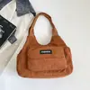 Bolsa de veludo feminina grande capacidade novo estilo moderna versátil nova bolsa de ombro único textura retrô feminina 2026 novo estilo