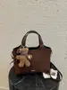 Bolsas Estilo Novo 2025 Bolsas Tote Estilo Coreano Bolsas de Ombro de Grande Capacidade Bolsas de Axila Textura de Luxo Leve Bolsas Saco para Mulheres